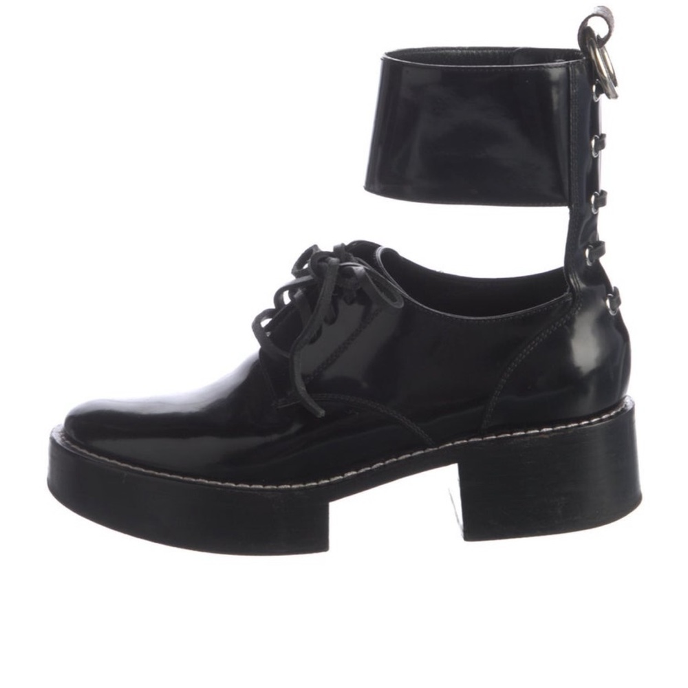 Louis Vuitton Corcovado Polished Leather ankle strap derby boots.